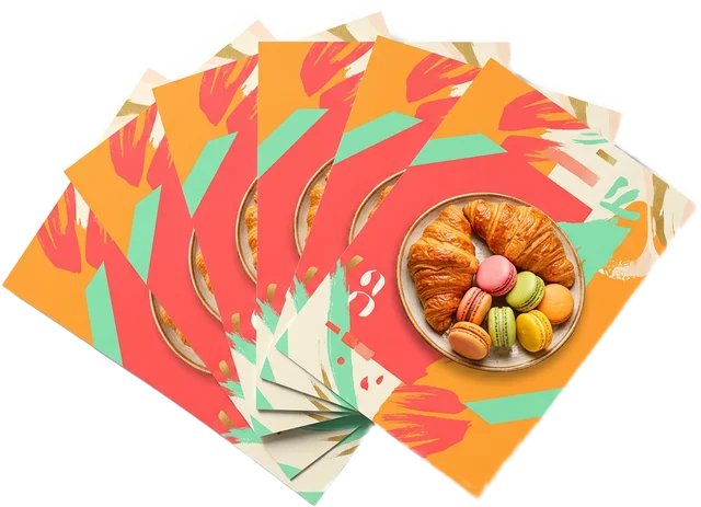 Colorful bakery flyers with croissants and macarons